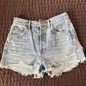 Agolde Distressed light blue denim shorts